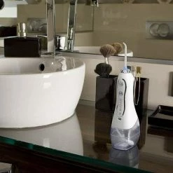 Nula Inspirations Nula Waterflosser - Tandsteen Verwijderaar - Monddouche - 6 Opzetstukken - Incl Opbergtas/ MicroTandenborstel - Zwart -Oral B SHOP 550x550 1888