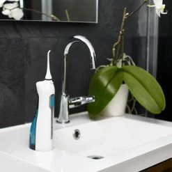 Opti Smile Optismile Waterflosser - Elektrische Monddouche - Draadloos En Oplaadbaar - Inclusief Twee Opzetstukken -Oral B SHOP 550x550 835